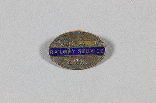 An oval Great Western Railway lapel badge marked Railway  Service, no.313179
