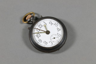A German open faced alarm pocket watch with enamelled dial  and Arabic numerals contained in a gun metal case