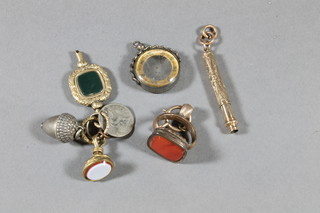 A gilt cased propelling pencil and a collection of seals