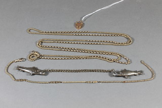 A gilt metal fancy link guard chain, a gilt metal chain and white metal cape clip in the form of 2 fish