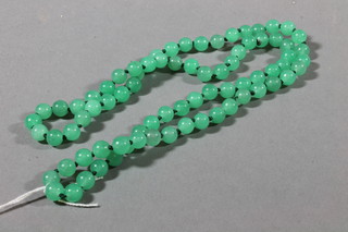 A string of green hardstone beads