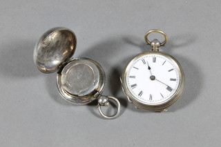 A silver sovereign case together with a fob watch with enamelled dial contained in a Continental silver case