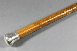 A Malacca walking cane with silver knob