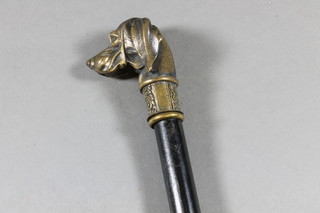 An ebony walking cane with bronze knob in the form of a  bloodhound