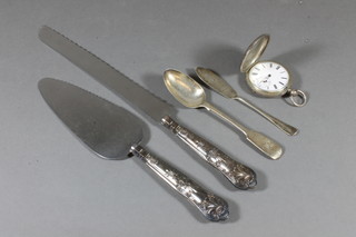 An open faced pocket watch contained in a silver case, a silver handled bread knife, do. cake slice etc