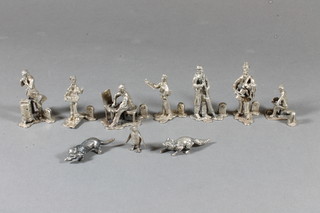 3 miniature silver figures of owls and 7 various white metal menu holders in the form of journeyman