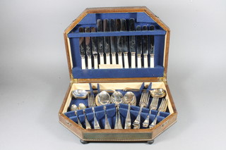 A canteen of silver plated Old English pattern flatware contained  in an oak canteen box