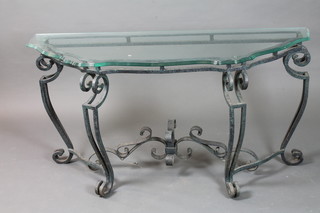A 19th Century French style moulded glass and wrought iron pier  table of serpentine form, raised on scrolled underframe 27"h x  52.5"w x 19"d