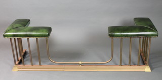 A George III style copper and brass adjustable club fender, having green leatherette seats, raised on reeded column supports,  plinth base 21"h x 67"w