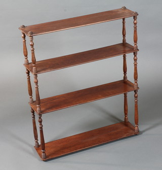 A set of 19th Century hanging shelves with turned spindle  supports 28"h x 24"w x 6"d