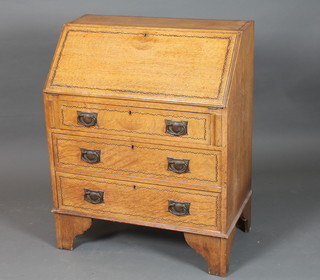 A late 19th/early 20th Century oak bureau, boxwood and ebony chequer line inlaid, the fall enclosing a fitted interior above 3  graduated long drawers on shaped bracket feet 37" h x 29.5"w x 17"d