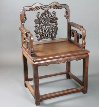 A Chinese padouk throne chair with pierced back decorated with  a bat, on shaped legs,
