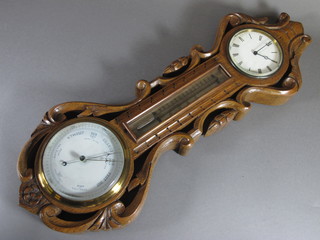 A late Victorian carved oak clock and barometer compendium,  the scroll carved mount set Roman enamelled dial above a silvered thermometer with aneroid barometer below 21"h x 8"w  x 2.5"