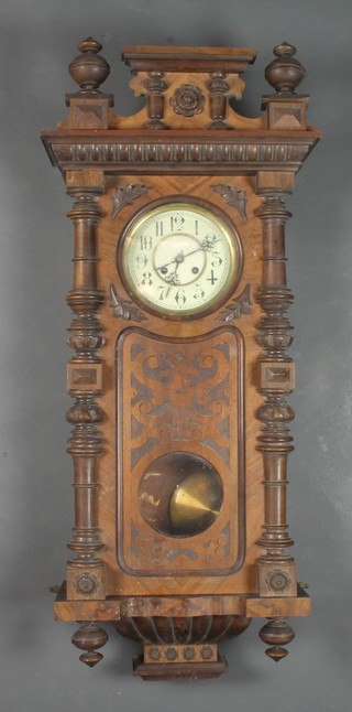 A late 19th Century Vienna walnut wall regulator of architectural form, having an Arabic breguet enamelled dial, set  8 day movement 44"h x 17"w
