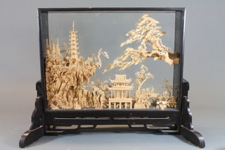 A Chinese cork sculpture, landscape with pagoda and bridges 19"  x 14"
