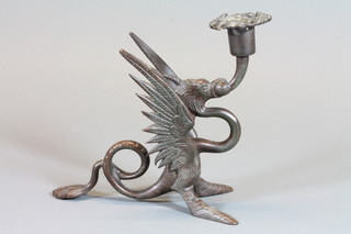A 19th Century bronze candlestick in the form of a griffin 7"