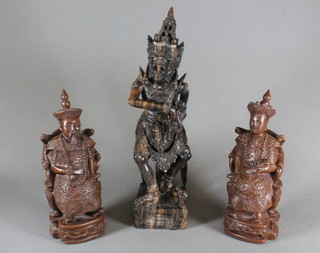 A carved Burmese? figure of a standing mythical beast 13" and 2  resin figures of Buddhas