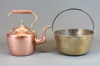 A 19th Century copper kettle and a brass preserving pan with iron handle