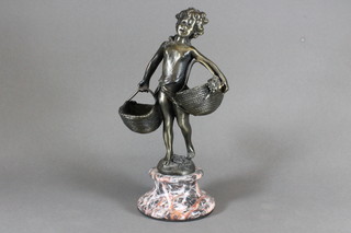 A bronze figure of a cherub with 2 baskets raised on a marble  base 11"