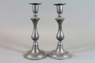 A pair of 19th Century pewter candlesticks of club form 11"