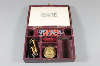 The New Georgian sealing set complete with burner and 4 seals,  contained in a leather box