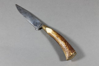 A 19th/20th Century Durk with 4.5" steel blade with stag grip  and gilt metal mounts