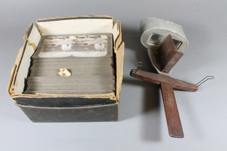 An Underwood stereoscopic viewer together with various Underwood & Underwood slides