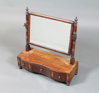 A George IV mahogany toilet mirror fitted a rectangular plate, raised on ring turned supports with 3 small drawers fitted to base  on turned feet 24"h x 21.5"w x 8.5"d