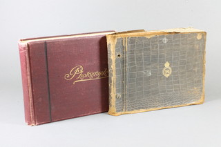 A leather bound The Royal Mail Steam Packet Company  photograph album containing various black and white photographs of the voyage of The RMS Araguaya and 1 other  photograph album containing black and white photographs of  County Show, Dog Show and Horse Driving carriages