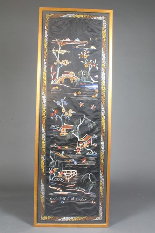 A Japanese embroidered silk panel depicting trees and bridges  53" x 17"
