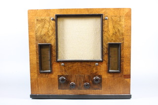 A His Master's Voice radiogram serial no.438381048 contained in a walnut case