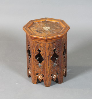 A Turkish carved hardwood octagonal tea table, mother of pearl inlaid, 15"h x 11"w