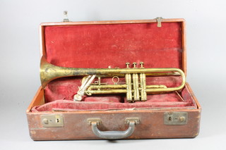 A Besson brass trumpet and 4 mouth pieces