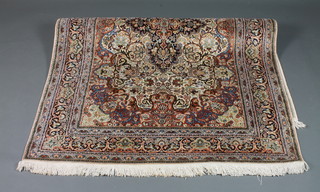 A silk Kashmir rug with central medallion 71" x 51"