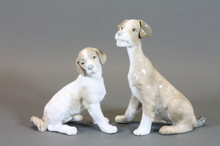 A Lladro figure of a seated Terrier, the base impressed Lladro  Spain 58 7" and 1 other figure of a dog, base impressed Lladro  Made in Spain 7"