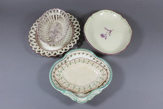 An 18th Century oval pottery bowl with floral decoration 10", chipped, a shaped dish 11", a lozenge shaped Turnerware platter  7", an 18th Century oval ribbonware dish 10" together with a  faience basket 8" - chip to basket
