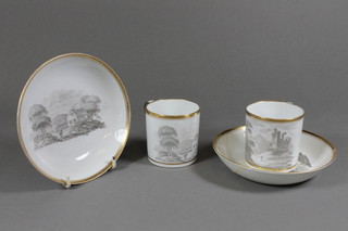 A pair of 18th/19th Century porcelain cabinet cups and saucers with monochrome decoration decorated buildings, 1 saucer f and  r,