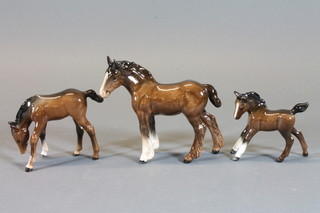 A Beswick Shetland Pony 5" and 2 Beswick foals 2" and 3"