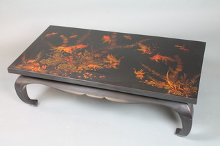 A black lacquered low opium table, top decorated in gilt studies  of fish and Rocaille, raised on splayed legs 15.5"h x 48"w x  24"d
