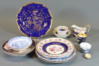 A 19th Century armorial porcelain plate with garter blue ground decorated flowers 8", f and r, a Sevres style porcelain plate, f  and r, and a collection of 19th Century tea ware