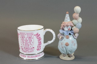 A Lladro figure - the clown balloon seller, base marked 5811 and  a Coalport limited edition Ironbridge mug to commemorate the  Queens Silver Jubilee