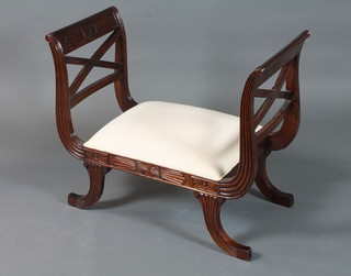A Regency style mahogany window stool with reeded frame and  stuff over seat, raised on splayed legs, 30.5h x 36"w x 17"d