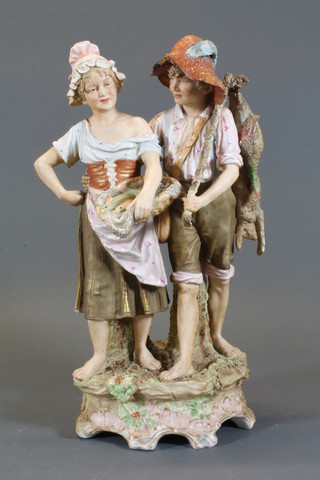 A 19th Century Royal Dux porcelain figure group of standing  boy and girl, base marked 381, boys hat chipped, 11"