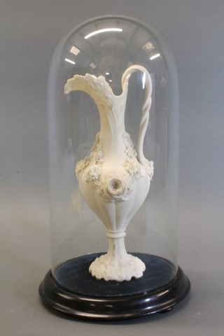 A Victorian Parian ewer with floral decoration 11" complete  with glass dome
