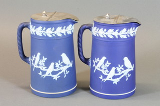 2 Wedgwood blue Jasperware style jugs decorated birds 6"