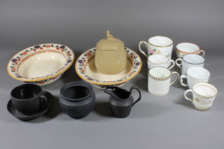 A Wedgwood brown glazed jar and cover, 2 Wedgwood oval  dishes with Imari style decoration 10", f, a 19th Century  porcelain mug marked ADA C.Chamberlain - cracked, 4 18th  Century Creamware mugs and 1 other, a black basalt cream jug  3", a black basalt jar 3" - lid missing and a Wedgwood black  basalt cup and saucer