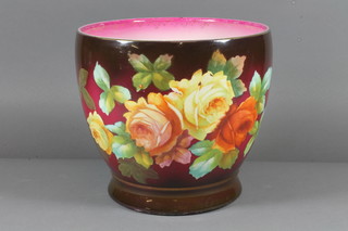 A Continental circular pottery jardiniere stand decorated roses 9"