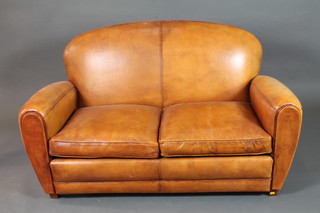 An Art Deco style 2 seat brown leather settee 58"w
