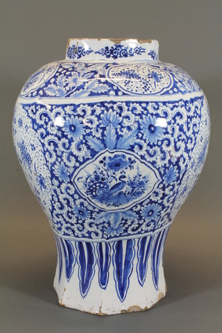 A 17th/18th Century Dutch Delft blue and white vase decorated birds and flowers 19"h ILLUSTRATED
