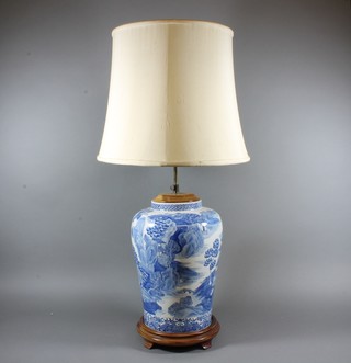 A pair of Chinese blue and white vases decorated pagodas converted to table lamps 17"